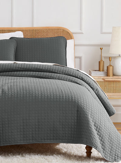 Quilt Set on bed in grey color