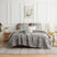 Front View of Ashanti Oversized 7-Piece Quilt Set in grey#color_ashanti-grey