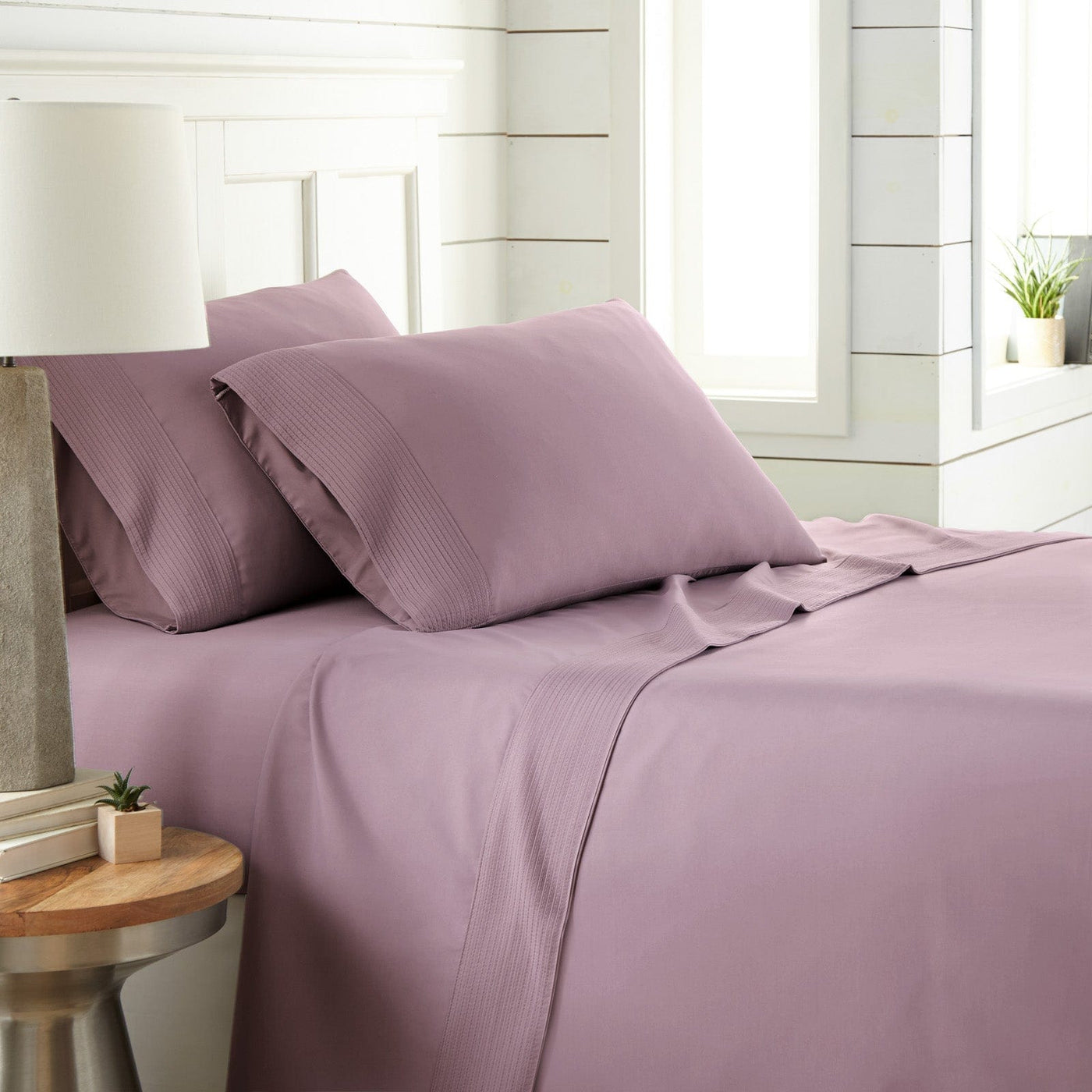 Side View of Vilano Extra Deep Pocket Pleated Sheet Set in Lavender#color_vilano-lavender