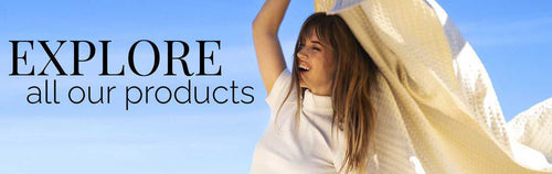 Explore all our products.  banner showing a girl with a blanket