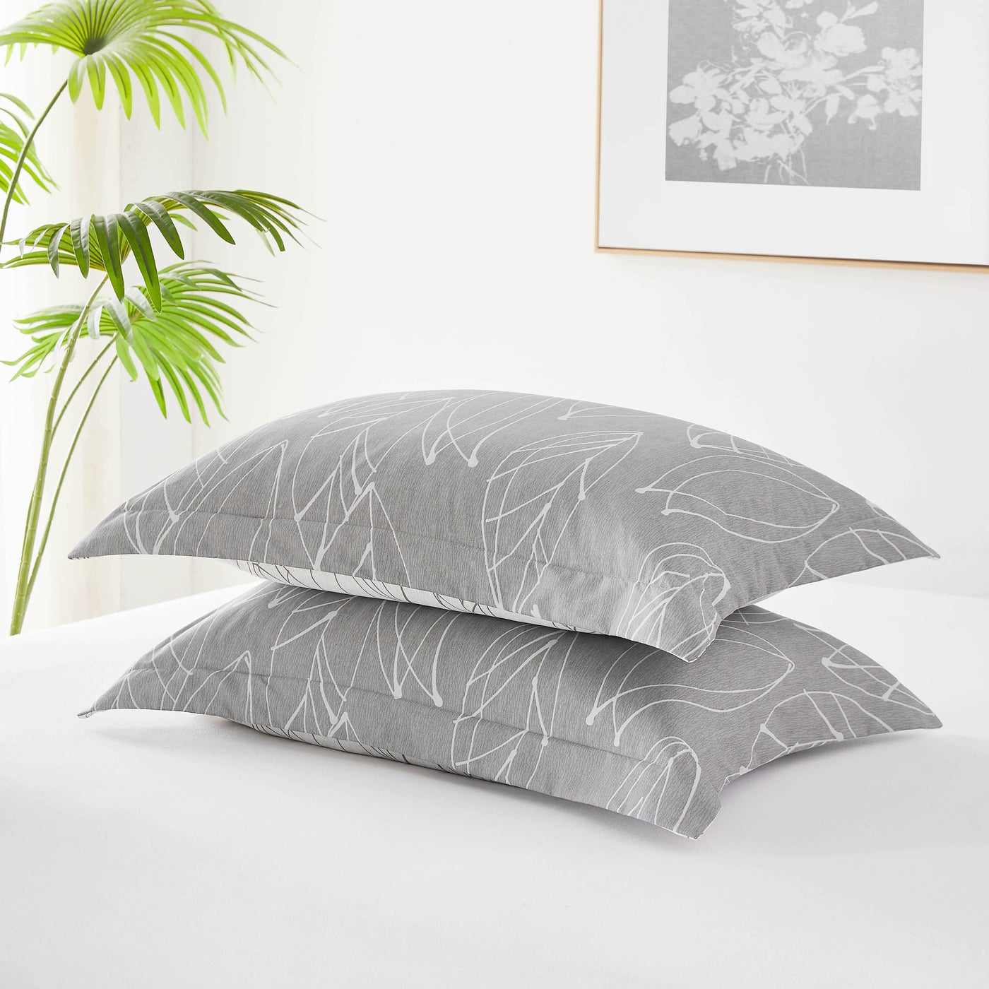 Detailed Shams Image of Reversible Modern Foliage Comforter Set in Grey#color_modern-foliage-grey