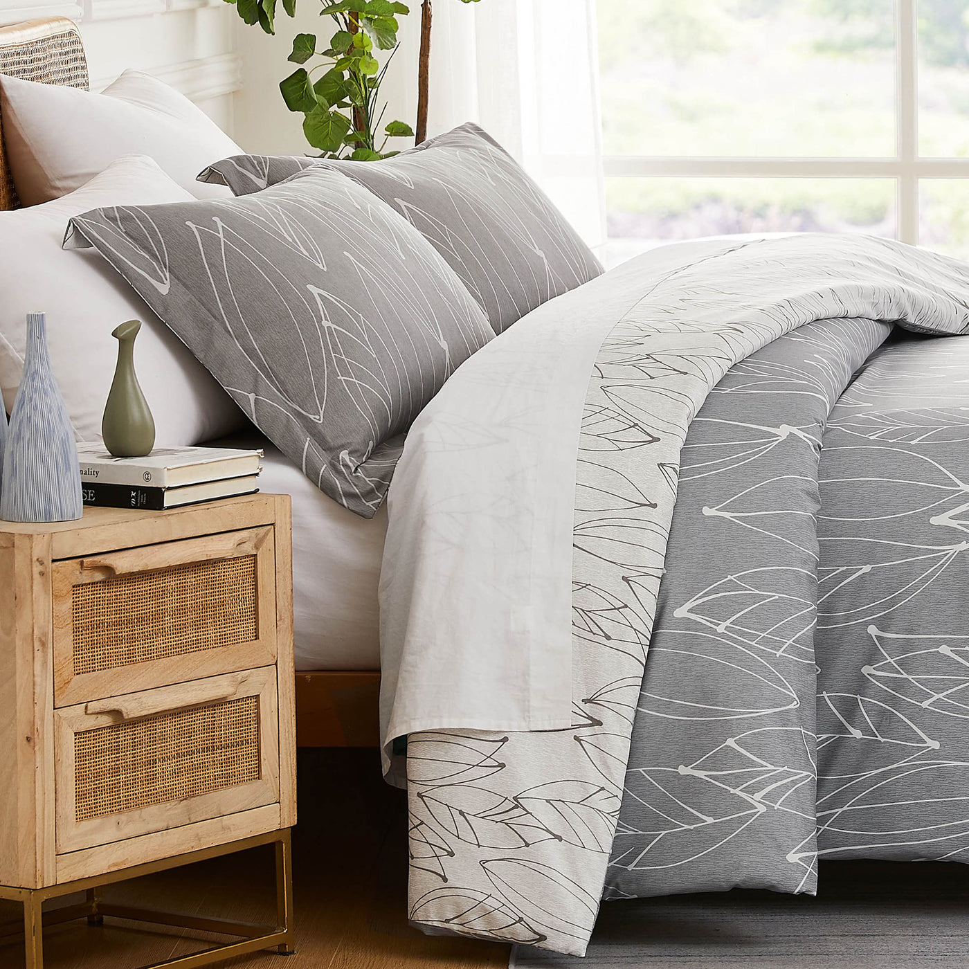 Side View of Reversible Modern Foliage Duvet Cover Set  in Grey#color_modern-foliage-grey