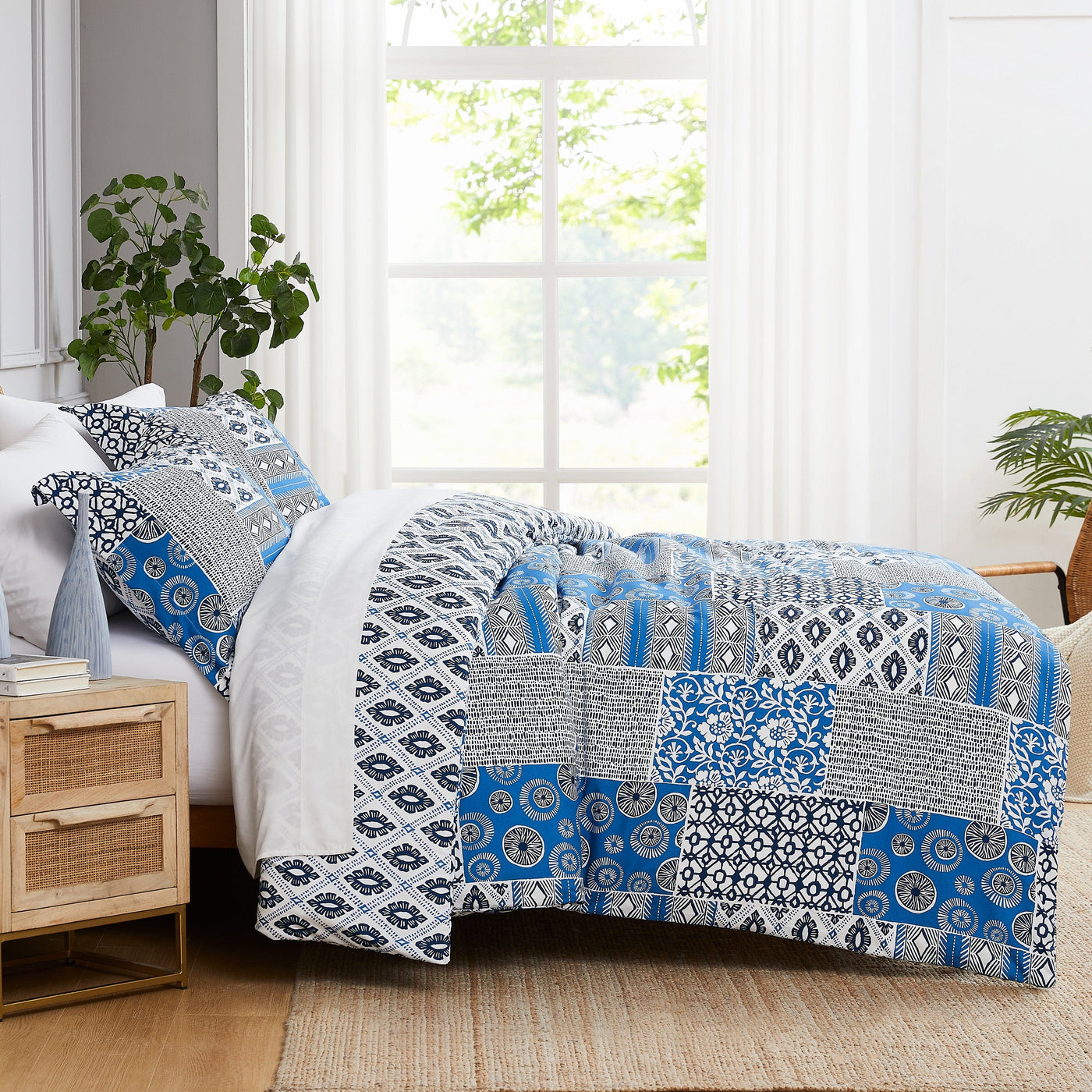 Side View of Global Patchwork Duvet Cover in blue#color_patchwork-blue
