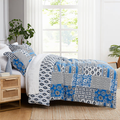 Side View of Global Patchwork Duvet Cover in blue#color_patchwork-blue