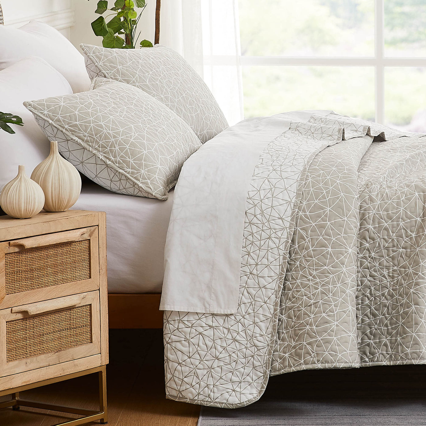 Side View of Geometric Maze Quilt Set in taupe#color_geometric-maze-taupe