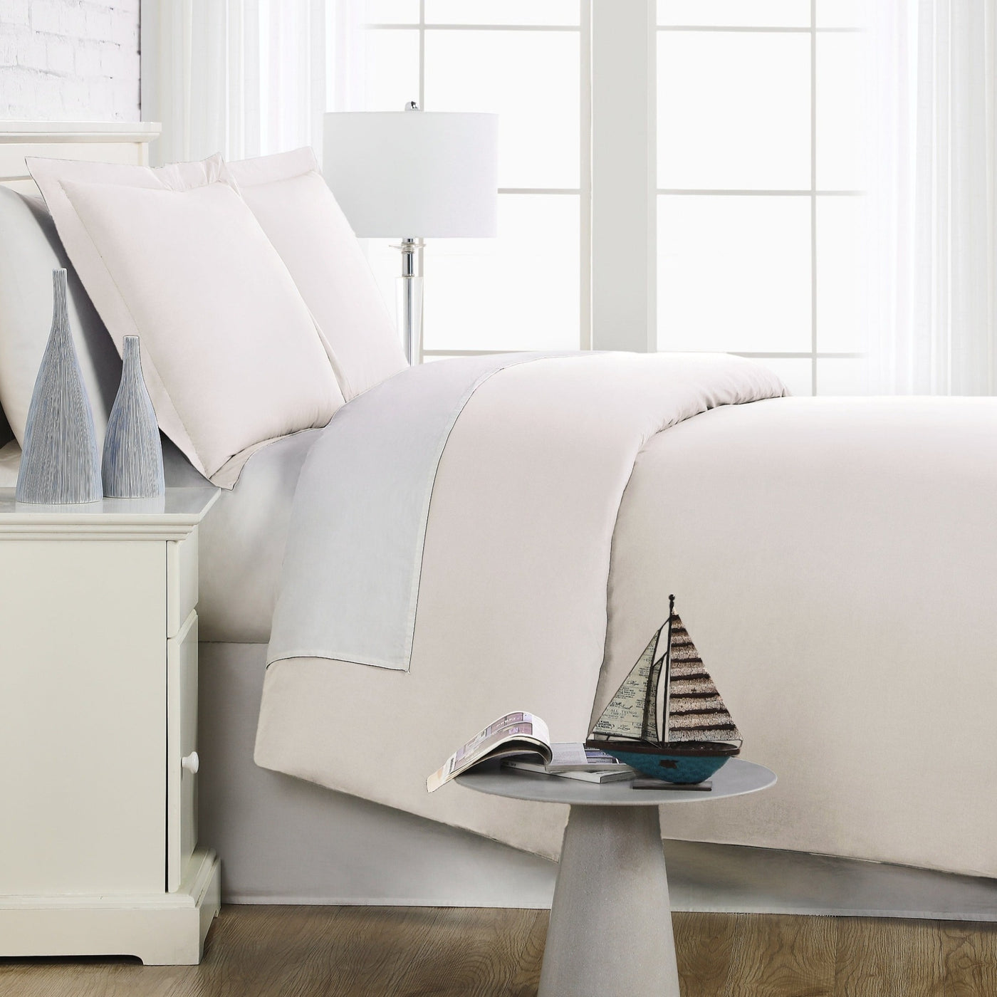 Side View of Everyday Essentials Duvet Cover Set in Bone#color_bone