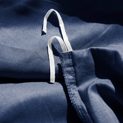 Close Up Image of Corner Ties of Everyday Essentials Duvet Cover Set in Navy Blue#color_navy-blue