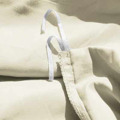 Close Up Image of Corner Ties of Everyday Essentials Duvet Cover Set in Off White#color_off-white