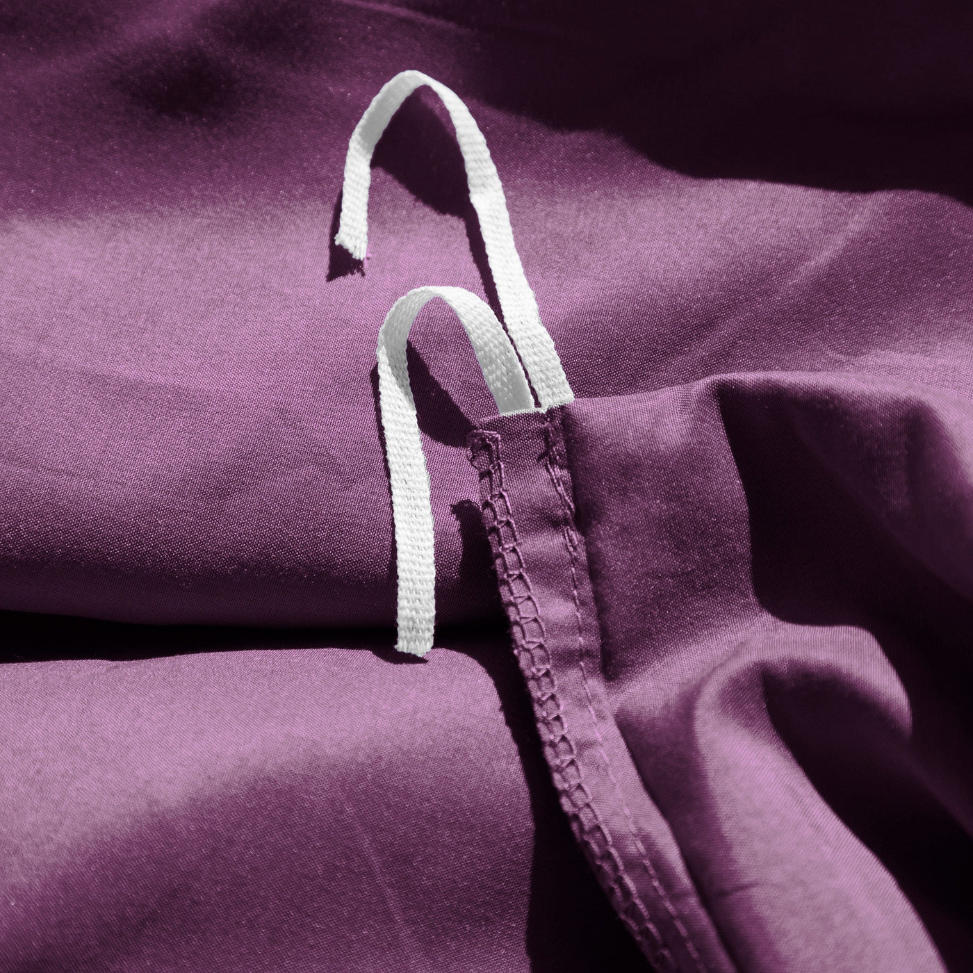 Close Up Image of Corner Ties of Everyday Essentials Duvet Cover Set in Purple#color_purple