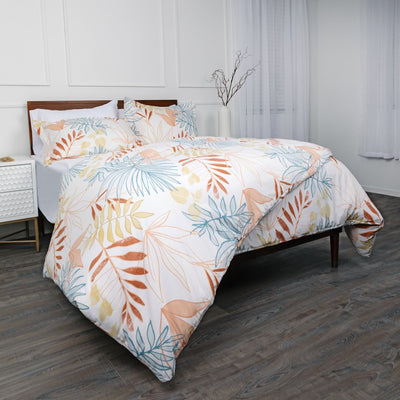 Angled View of Tropic Leaf Comforter Set in Cream#color_tropic-leaf-cream