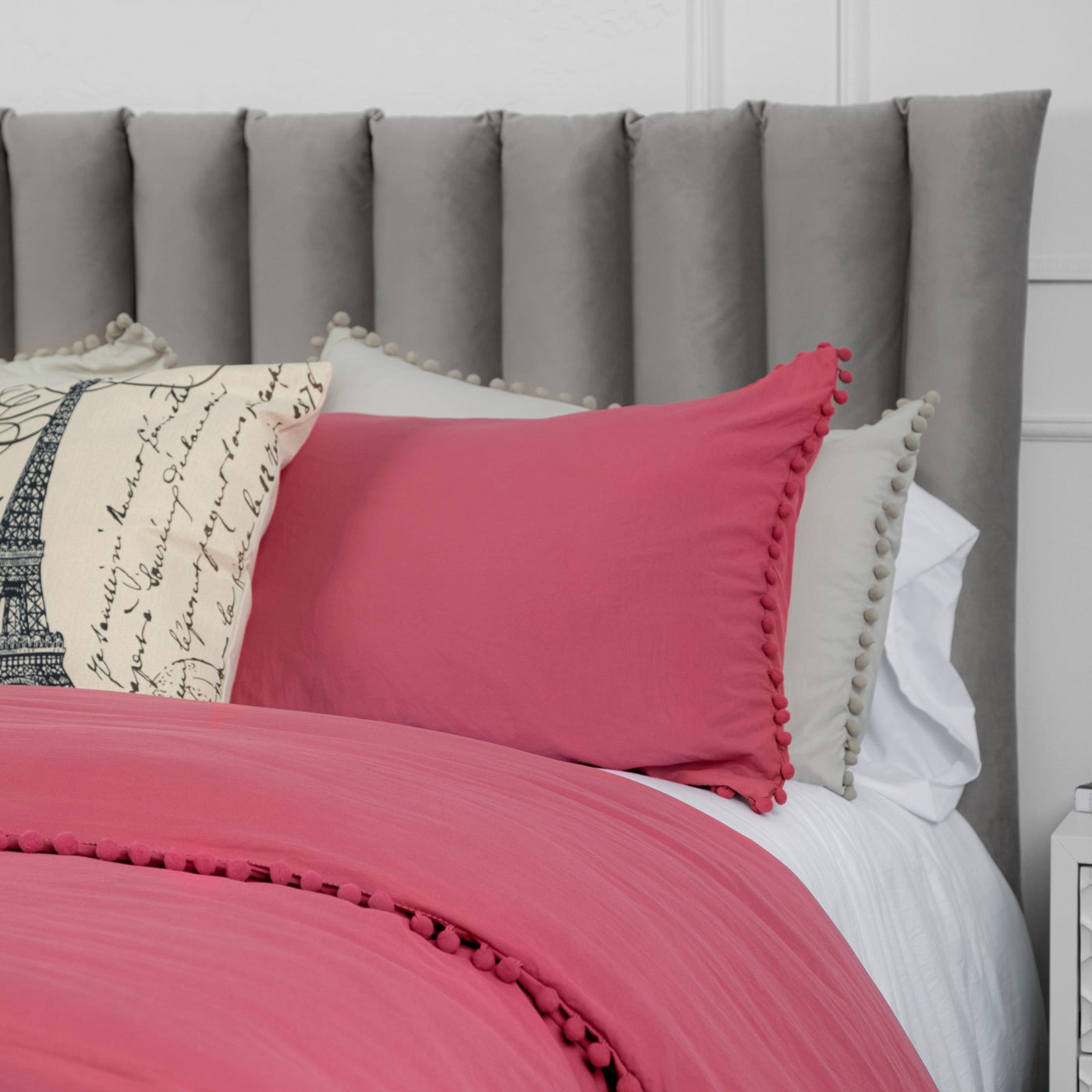 Side View of Pom-Pom Duvet Cover Set in Rose#color_rose