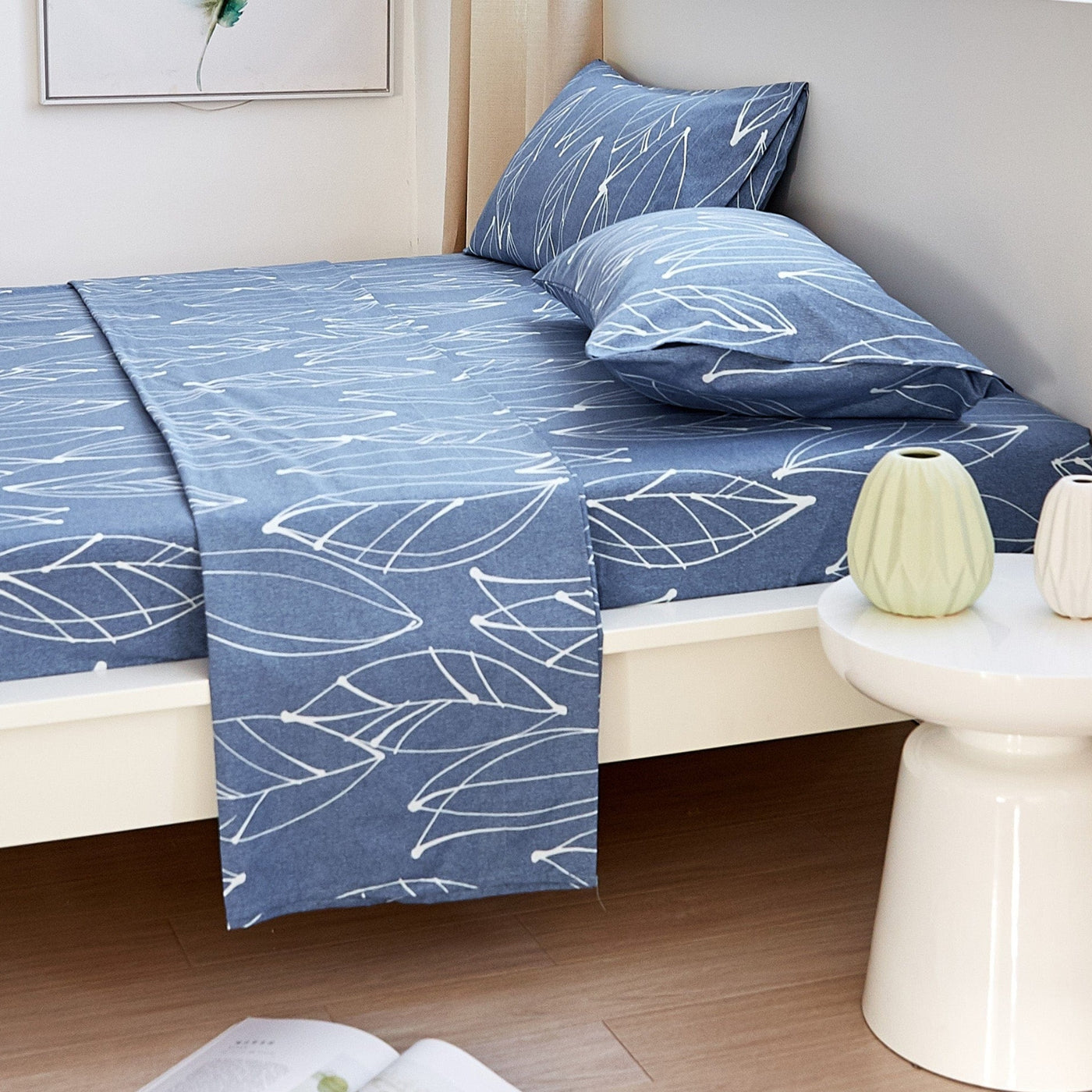 Side View of Modern Foliage Sheet Set in Blue and White#color_modern-foliage-blue
