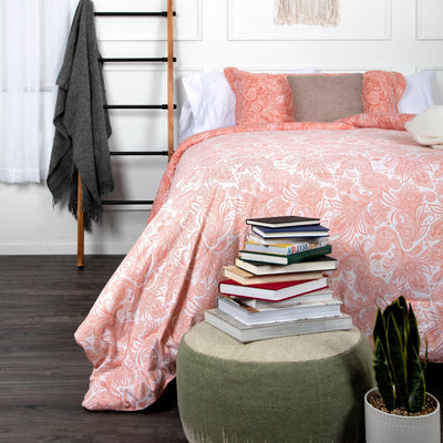Half Front View of Perfect Paisley Reversible Comforter Set in Coral#color_perfect-paisley-coral-haze