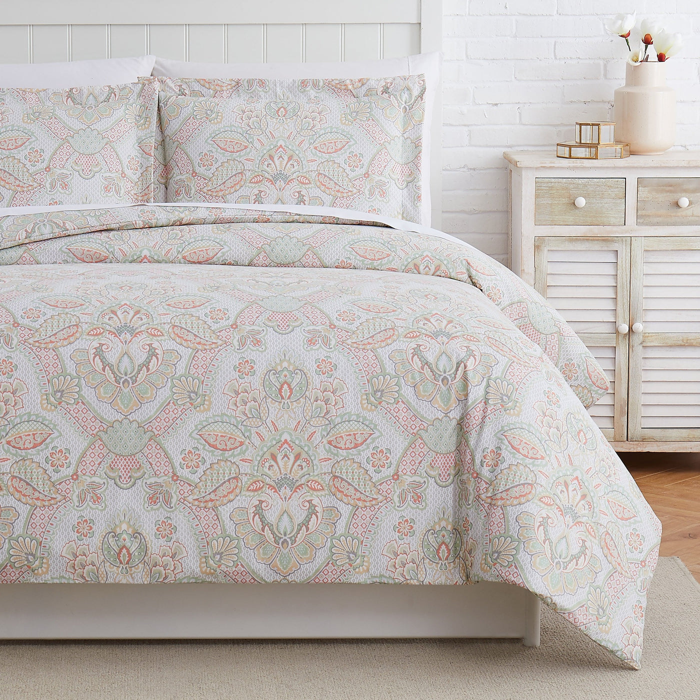 Half Front View of Enchantment Duvet Cover Set in Coral#color_enchantment-coral