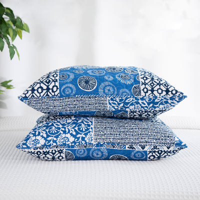 Global Patch Quilted Sham Covers Stack Together in Blue#color_global-patch-blue