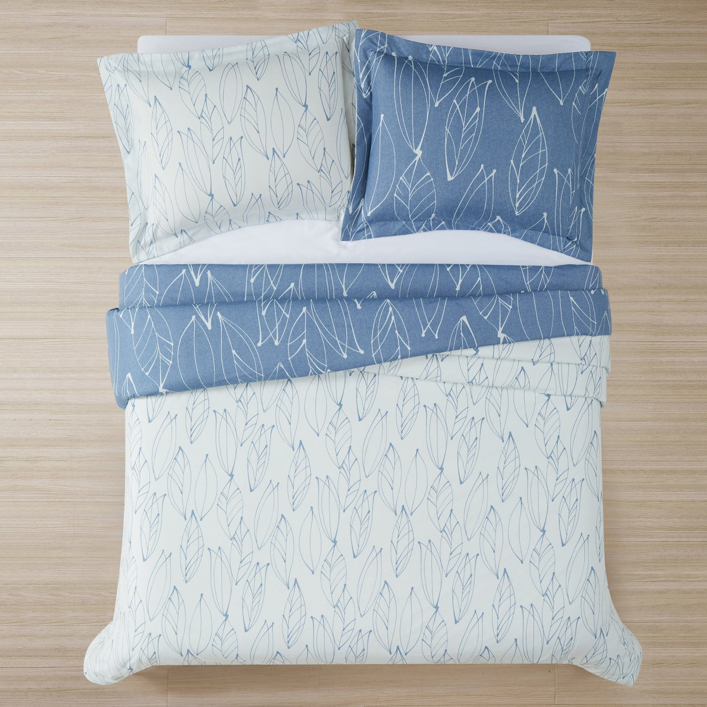 Top View of Modern Foliage Reversible Duvet Cover Set in Blue#color_modern-foliage-blue