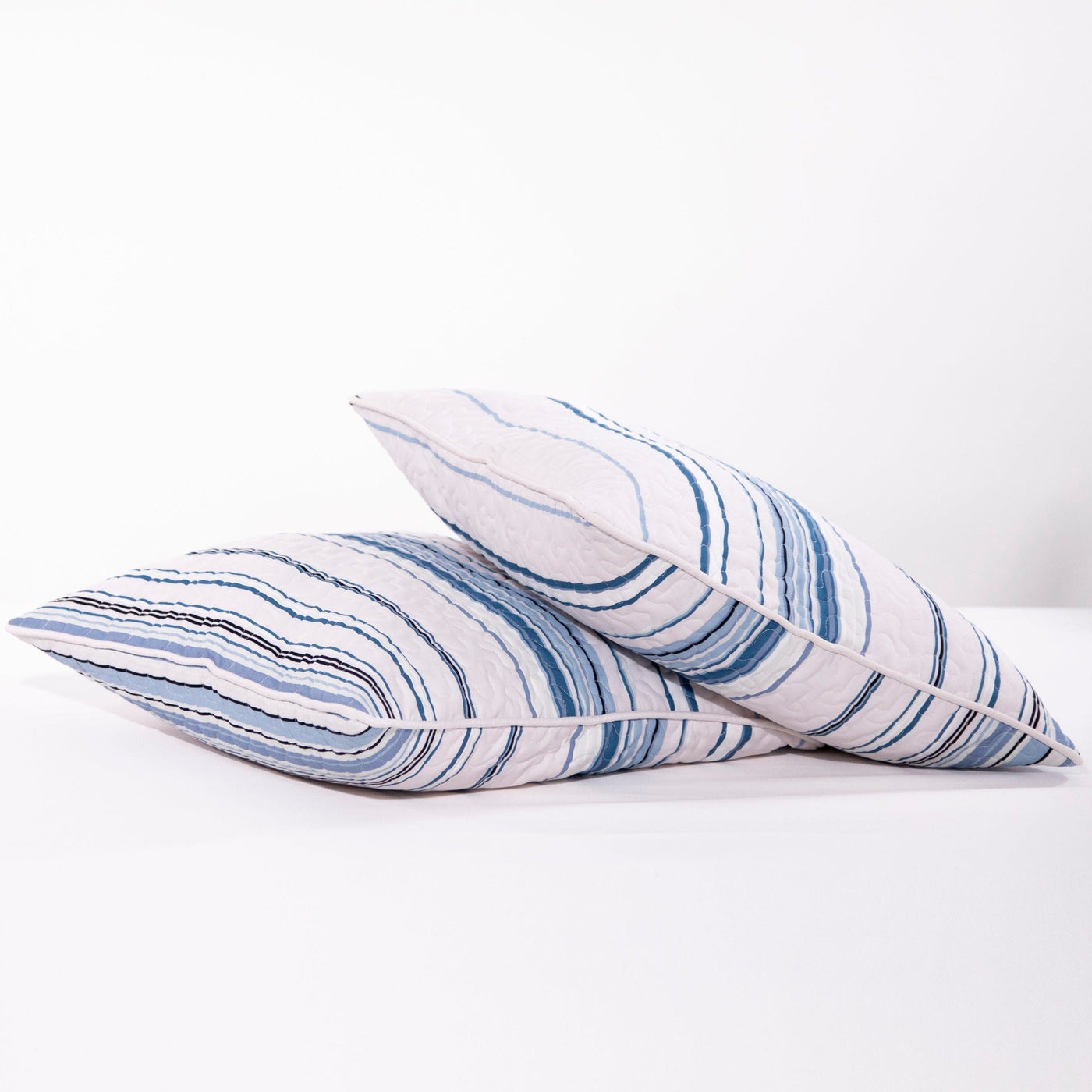 Details and Texture of Coastal Stripes Quilted Sham Covers in Blue#color_coastal-stripe-blue