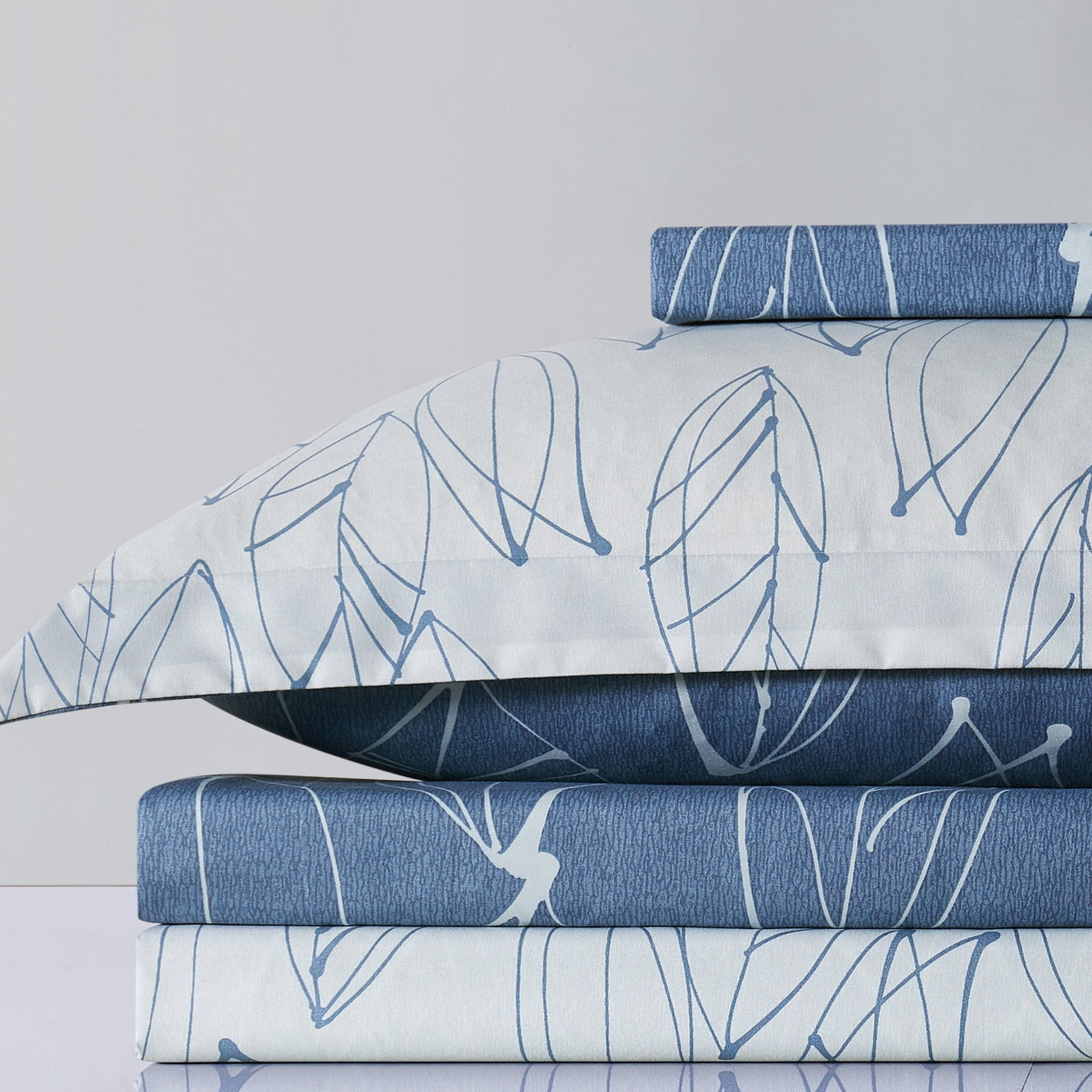 Modern Foliage Reversible Duvet Cover Set in Blue Stack Together#color_modern-foliage-blue