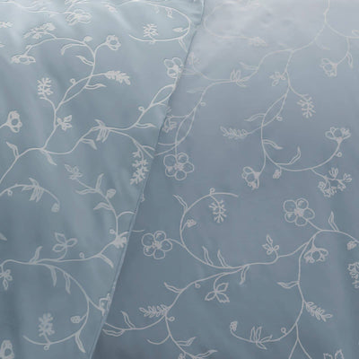Details and Print Pattern of Sweetbrier Duvet Cover Set in Blue with White Flowers#color_sweetbrier-ballard-blue-with-white-flowers