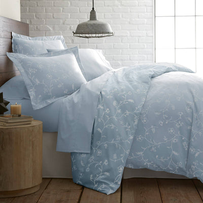 Side View of Sweetbrier Duvet Cover Set in Blue with White Flowers#color_sweetbrier-ballard-blue-with-white-flowers