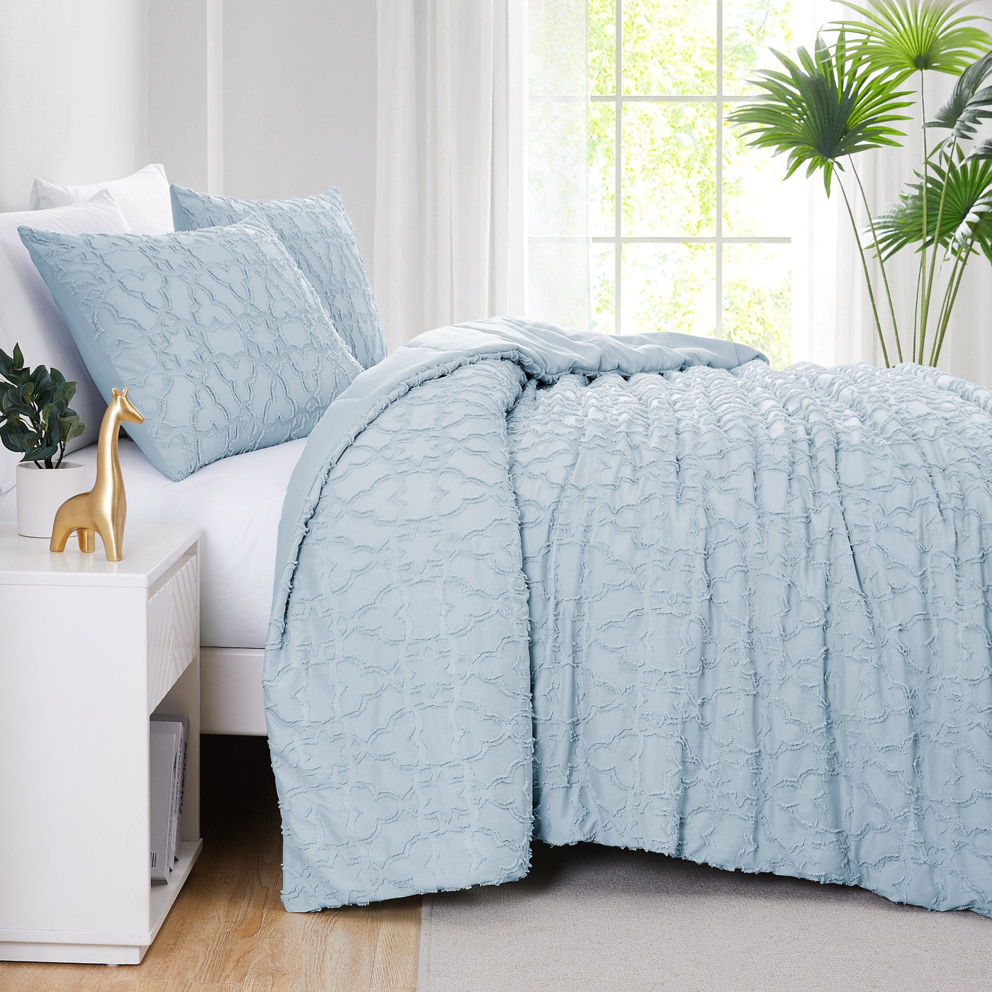 Side View of Marrakech Clipped Jacquard Comforter Set in Blue#color_blue-clipped-jacquard