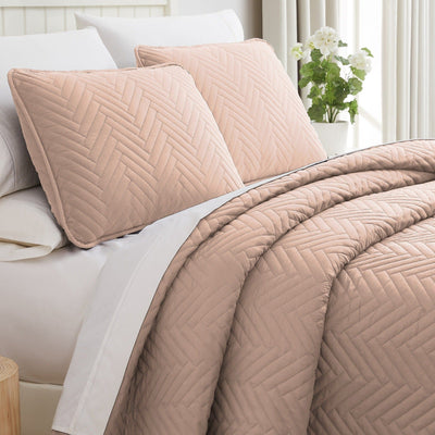 Side View of Chevron Oversized Quilt Set in Rose Dust#color_chevron-rose-dust