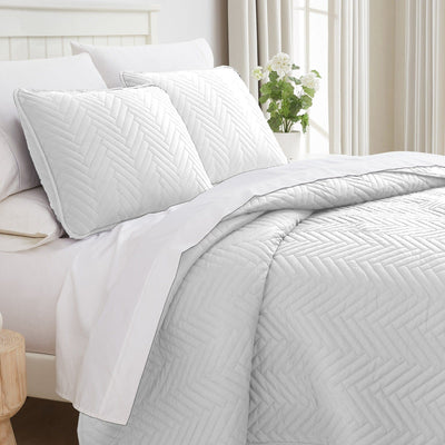 Side View of Chevron Oversized Quilt Set in White#color_chevron-white