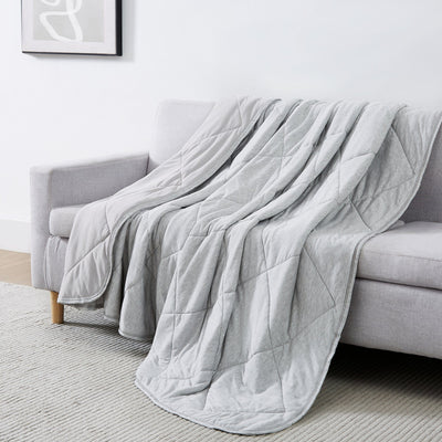Performance Cooling Blankets and Throws on Couch in Grey#color_cooling-blanket-grey