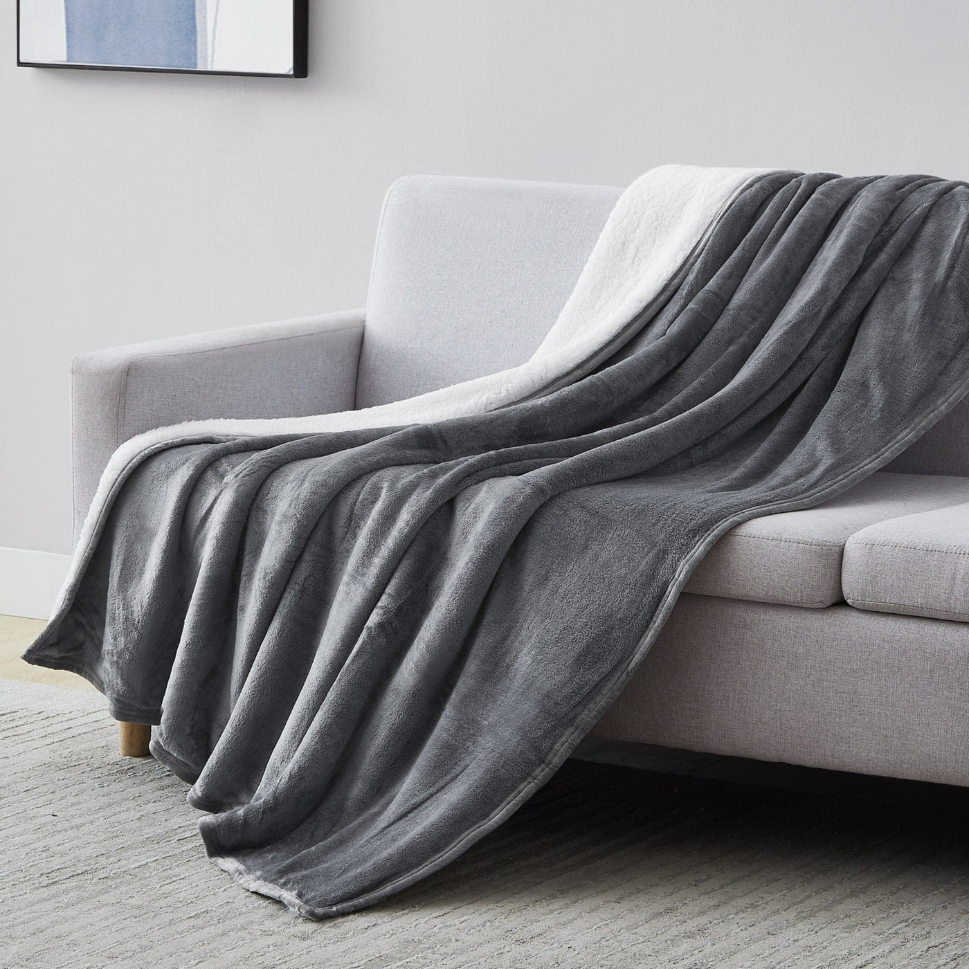 Sherpa-Fleece Oversized Reversible Blankets and Throws in Slate on Sofa#color_microfleece-slate