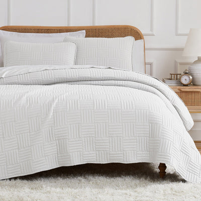 Half Front View of Grid Oversized Quilt Set in White#color_grid-white