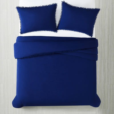 Top View of Pom-Pom Duvet Cover Set in Navy Blue#color_navy-blue