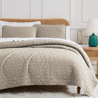 Half Front View of Pebbles Oversized Quilt Set in Sandy Taupe#color_pebbles-taupe