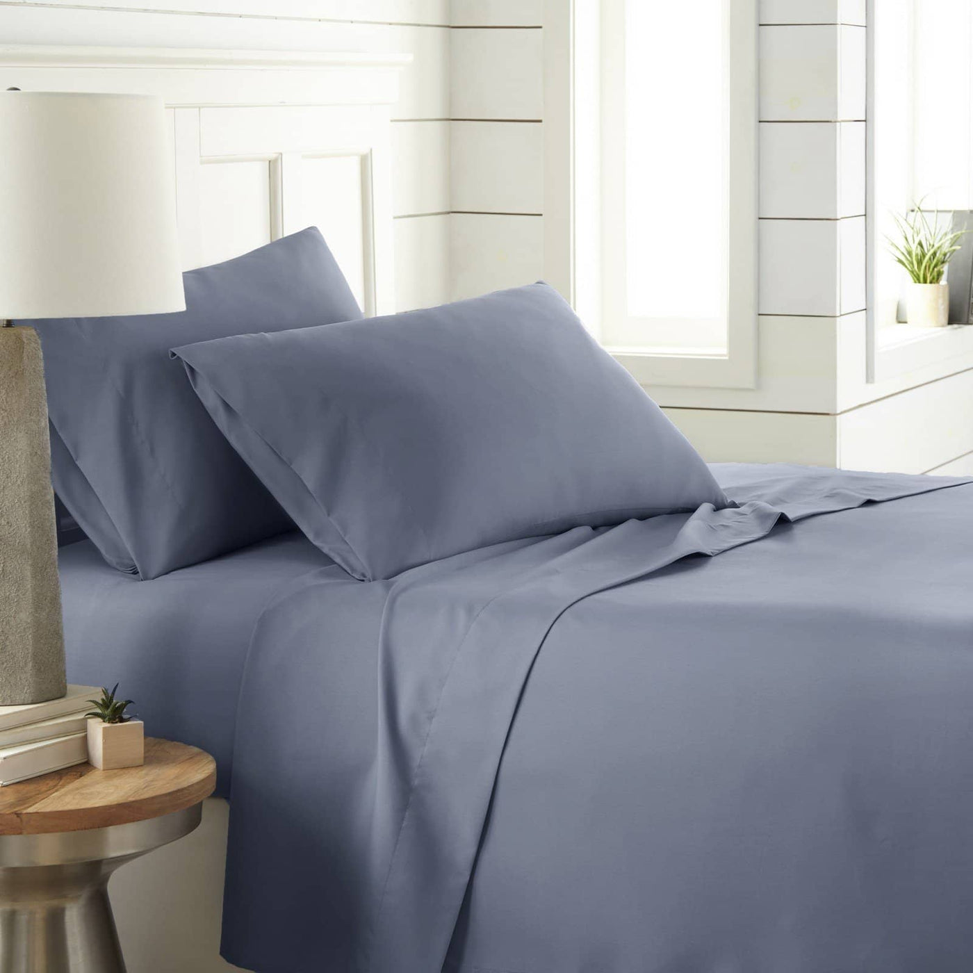 Angled View of Southshore Essentials 4-Piece Sheet Set in Steel Blue#color_steel-blue