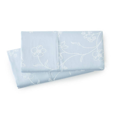 Sweetbrier 100% Cotton Sateen Pillow Cases in Ballard Blue with White Flowers#color_sweetbrier-ballard-blue-with-white-flowers