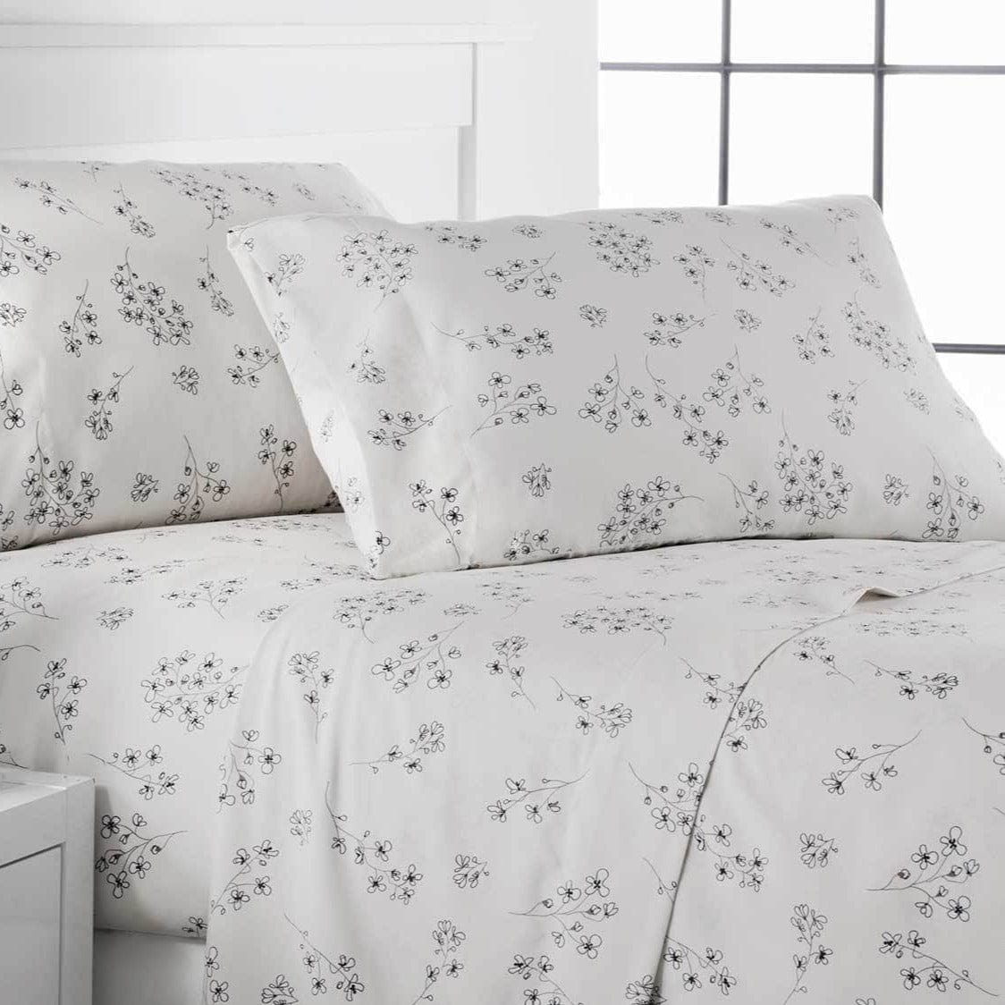 Close Up View of Sweet Florals Pillow Shams in Cream#color_sweet-lunar-grey