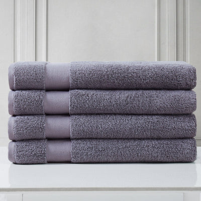4 Piece of Super-Plush Bath Towel in Lavender Stack Together#color_medium-weight-classic-towel-muted-lavender