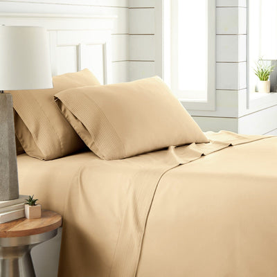 Side View of Vilano Extra Deep Pocket Pleated Sheet Set in Gold#color_vilano-gold