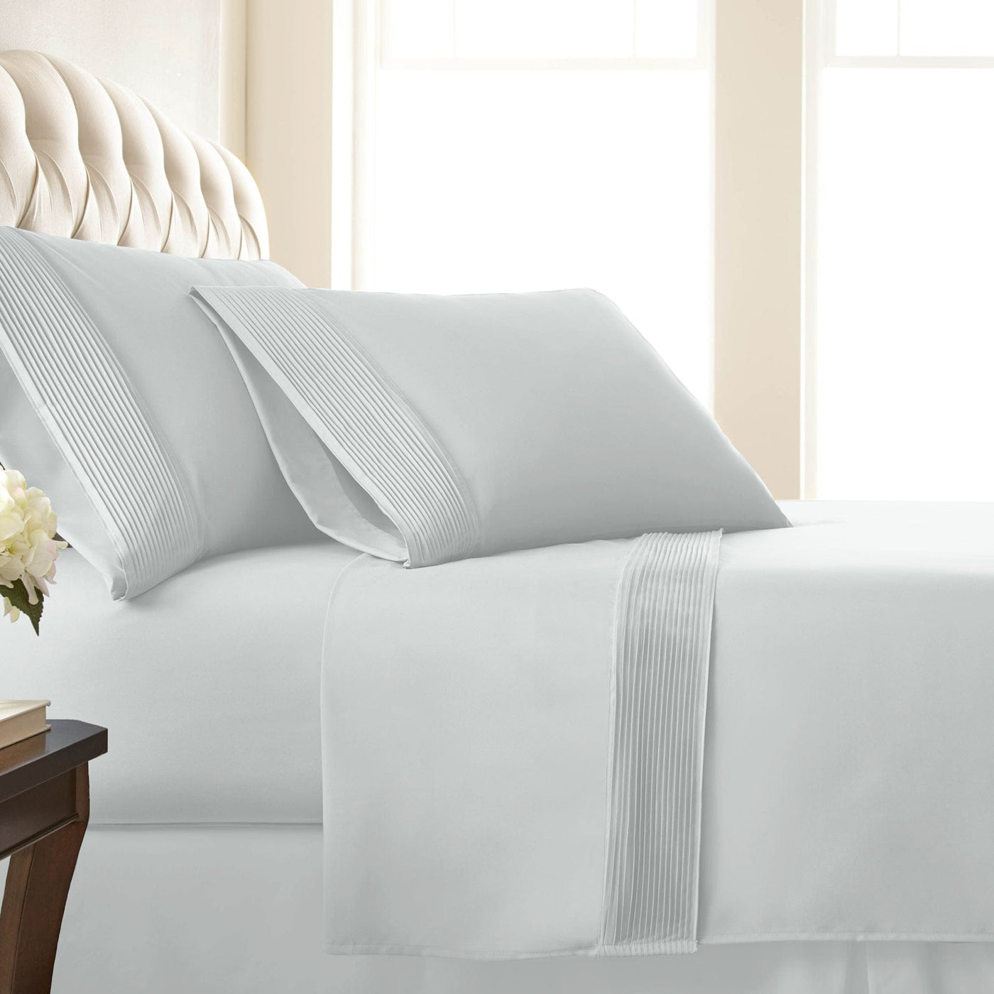 Side View of Vilano Extra Deep Pocket Pleated Sheet Set in White#color_vilano-bright-white