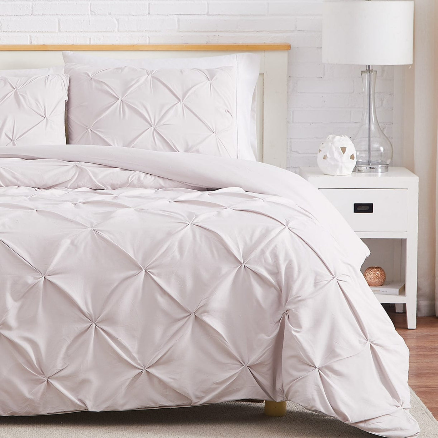 Half Front View of Pintuck Pinch Pleated Duvet Cover Set in Bone#color_vilano-bone