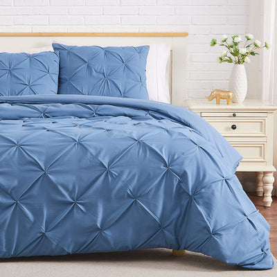 Half Front View of Pintuck Pinch Pleated Duvet Cover Set in Coronet Blue#color_vilano-coronet-blue