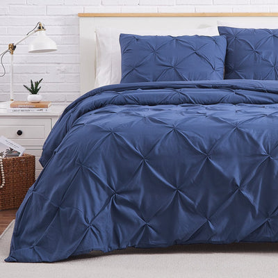 Half Front View of Pintuck Pinch Pleated Duvet Cover Set in Dark Blue#color_vilano-dark-blue