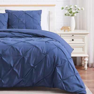 Half Front View of Pintuck Pinch Pleated Duvet Cover Set in Dark Blue#color_vilano-dark-blue