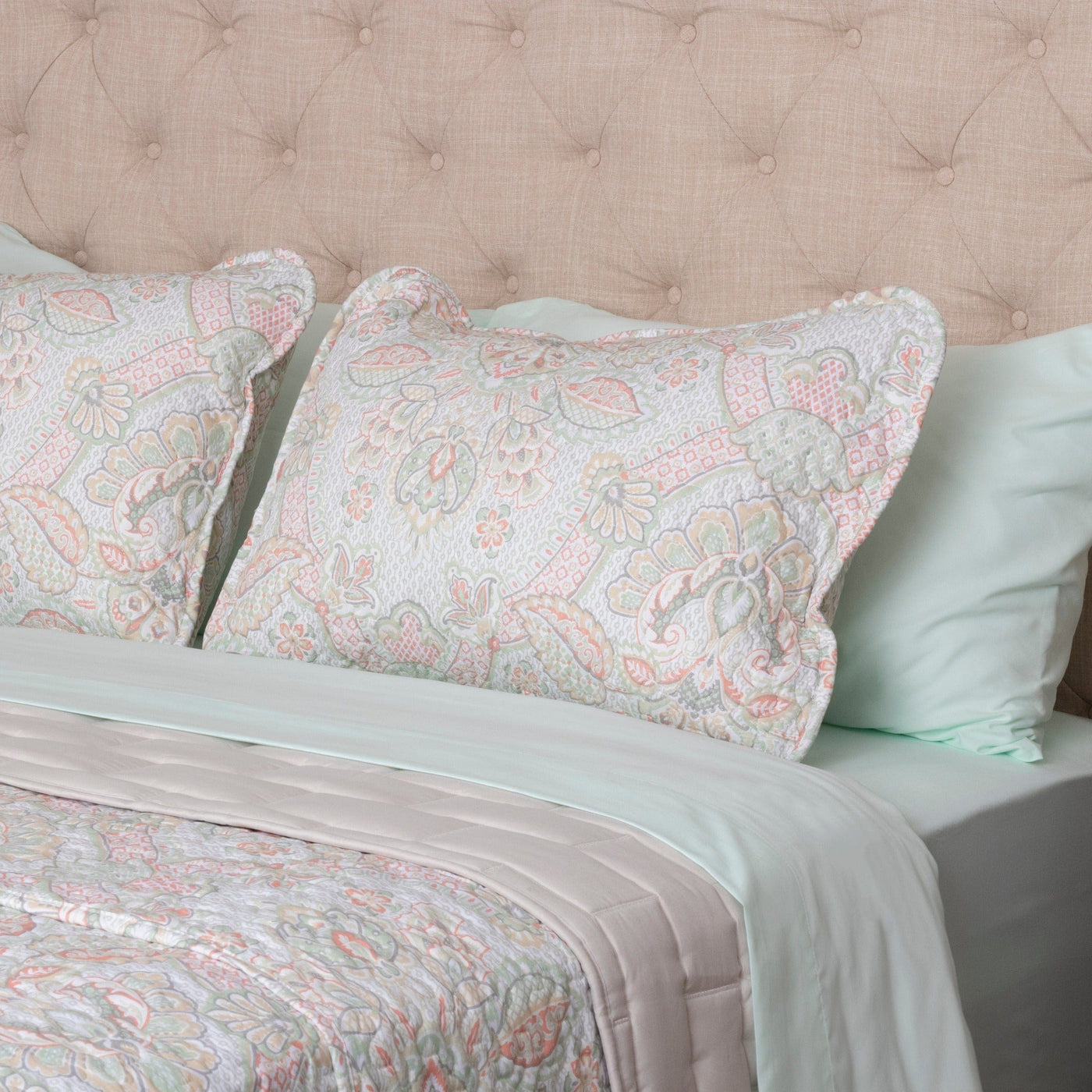 Angled View of Enchantment Quilt Set in Coral#color_enchantment-coral