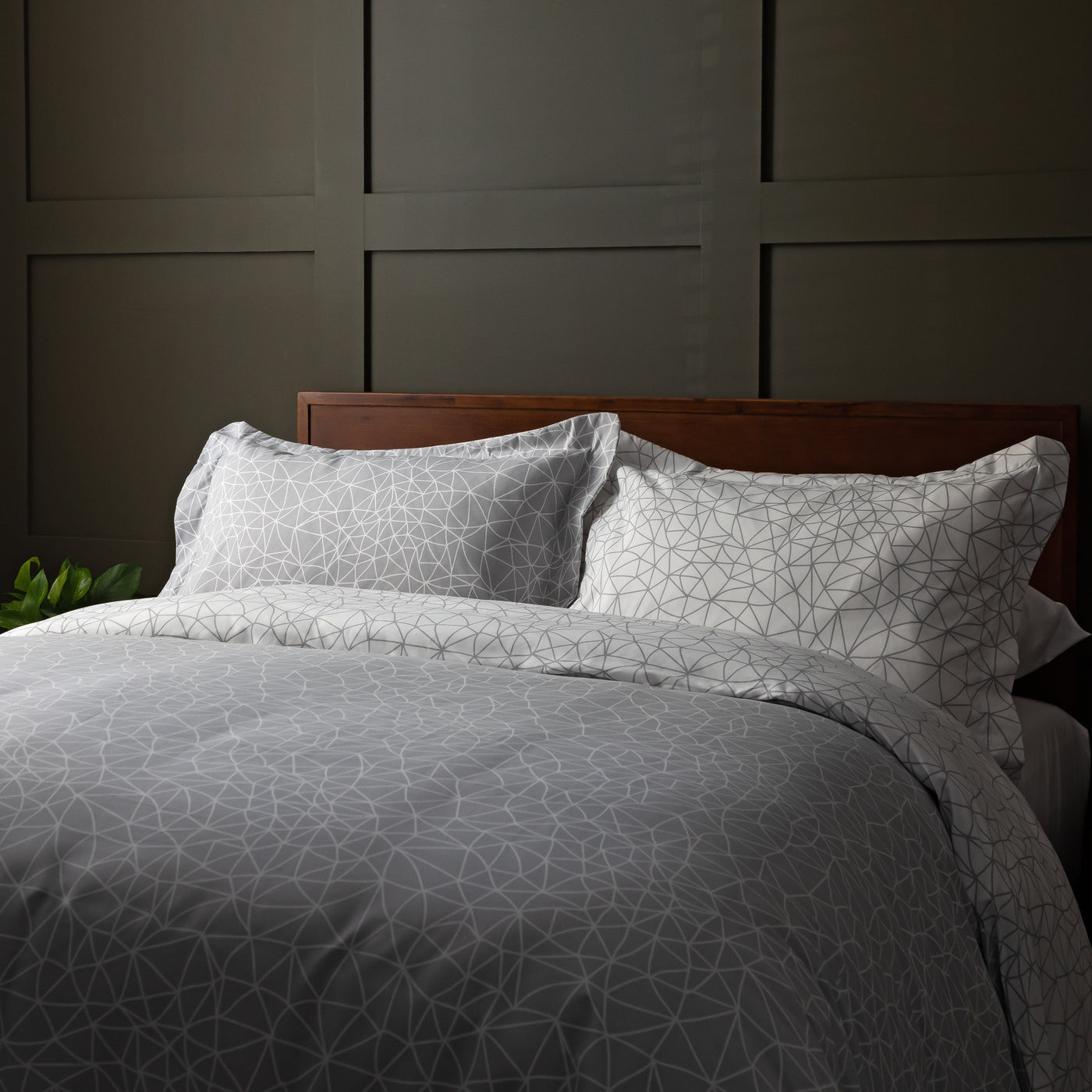 Side View of Geometric Maze Reversible Duvet Cover Set in Grey#color_geometric-maze-grey