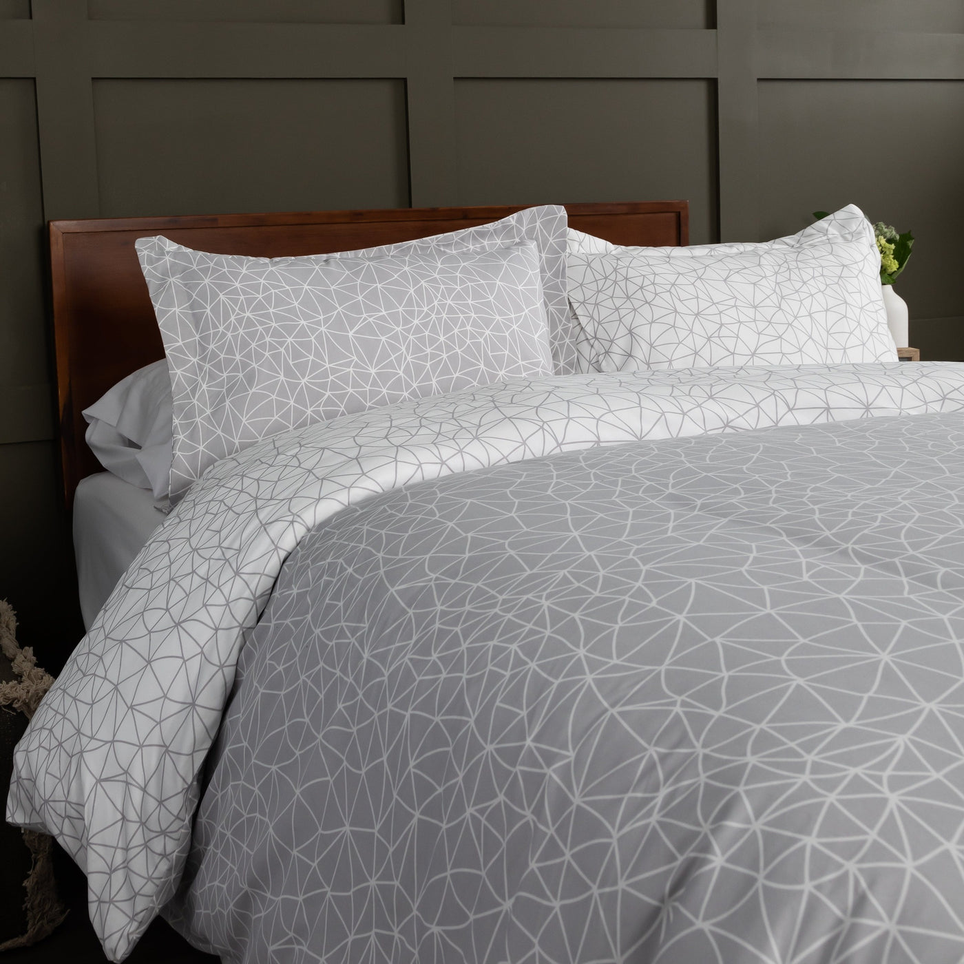 Side View of Geometric Maze Reversible Duvet Cover Set in Grey#color_geometric-maze-grey