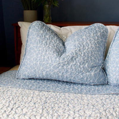 Close Up Image of Geometric Maze Reversible Quilt Set Pillow Shams in Blue#color_geometric-maze-blue