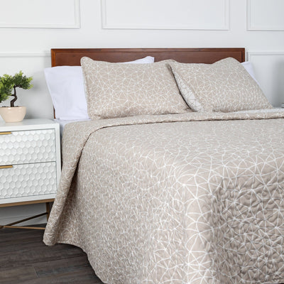 Side View of Geometric Maze Reversible Quilt Set in Taupe#color_geometric-maze-taupe