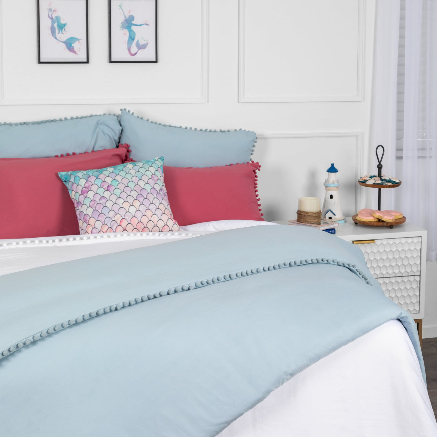 Side View of Pom-Pom Duvet Cover Set in Light Blue#color_light-blue