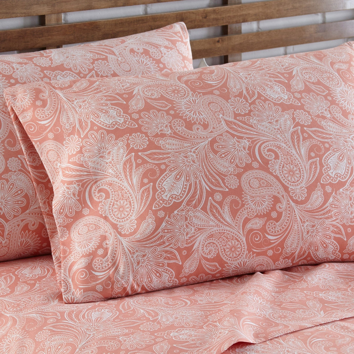 Close Up Image of Perfect Paisley Sheet Set in Coral Pillow Shams#color_perfect-paisley-coral-haze-with-white