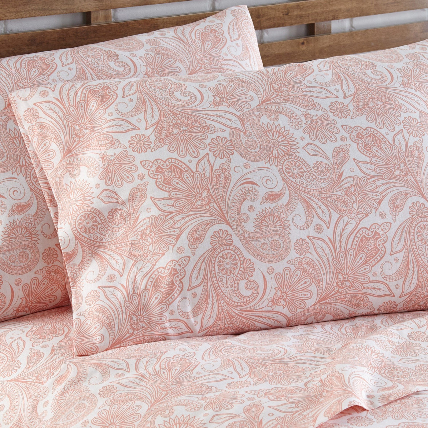 Close Up View of Perfect Paisley in White and Coral Pillows Shams#color_perfect-paisley-white-with-coral-haze